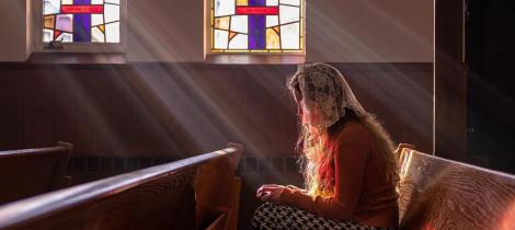 a woman in prayer 