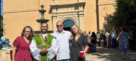 family in front of church 