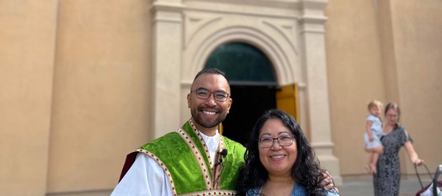 Brother and sister in front of church 
