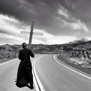 Priest on a country road