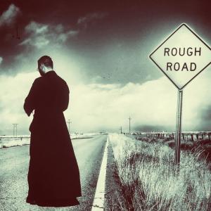 Priest Stands in the Road