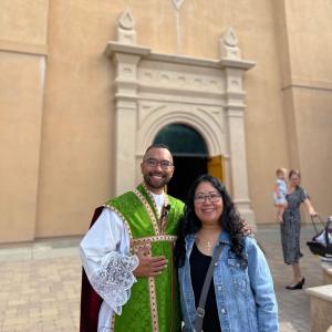 Brother and sister in front of church 