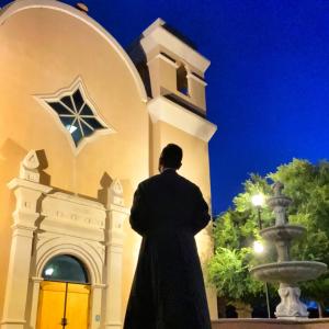 Standing in front of church 