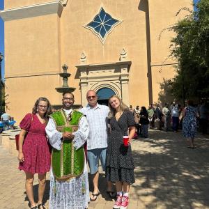 family in front of church 