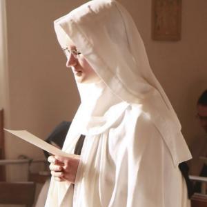 nun in prayer